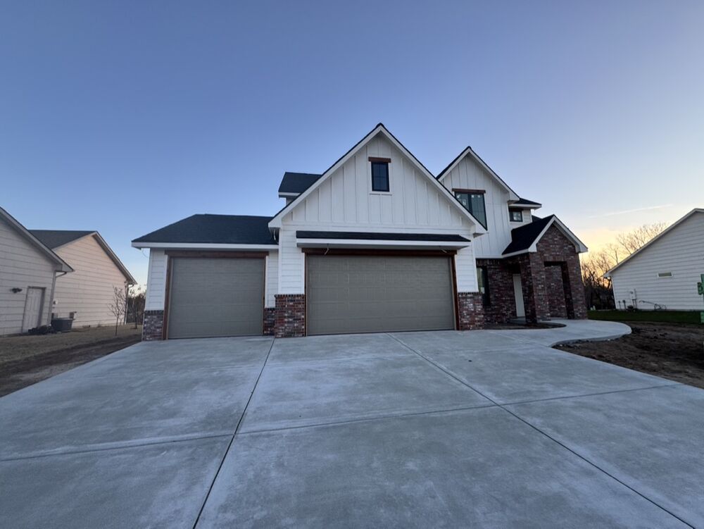 New Tallgrass custom home build, front elevation at dusk