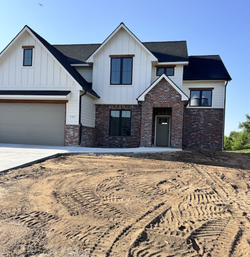 New Tallgrass build, front exterior on freshly graded lot