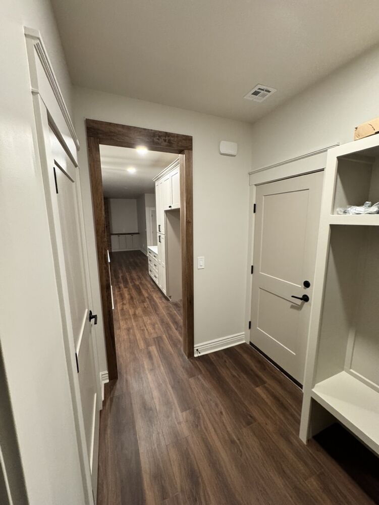New Tallgrass build, hallway leading to kitchen with mudroom storage