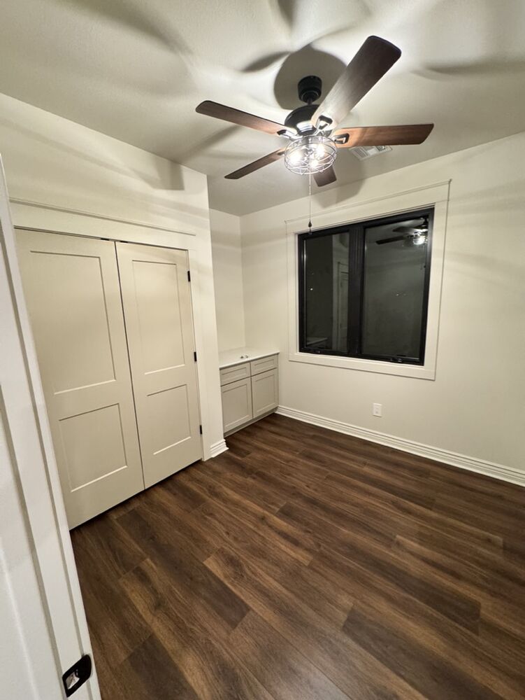 New Tallgrass build, bedroom with closet doors and ceiling fan