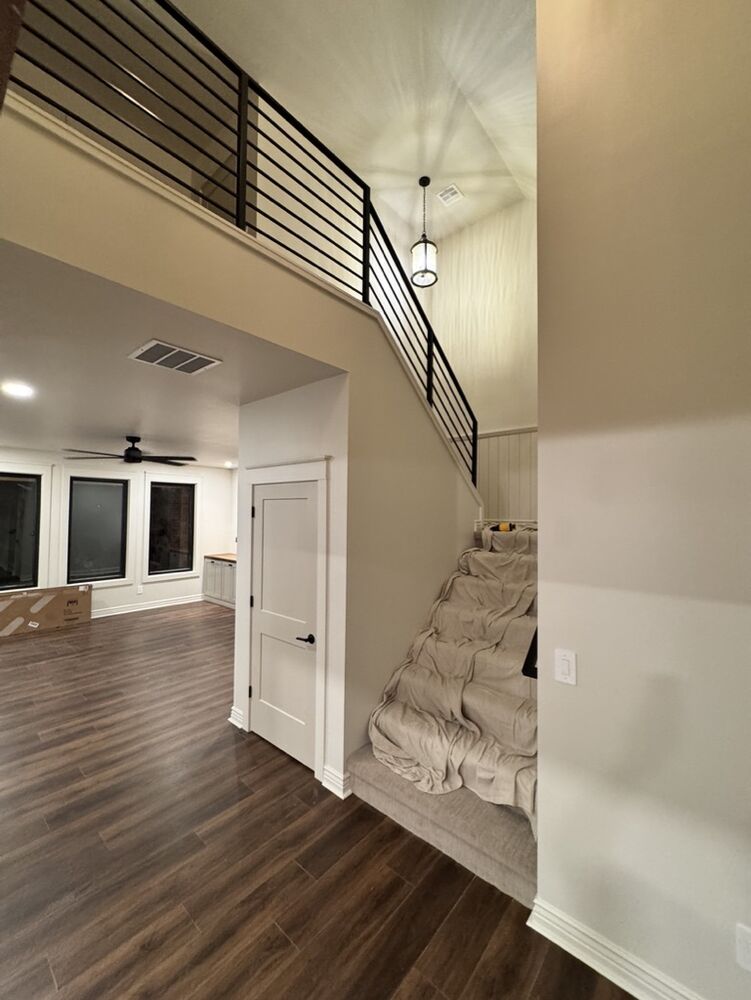 New Tallgrass build, stairwell landing view toward living area