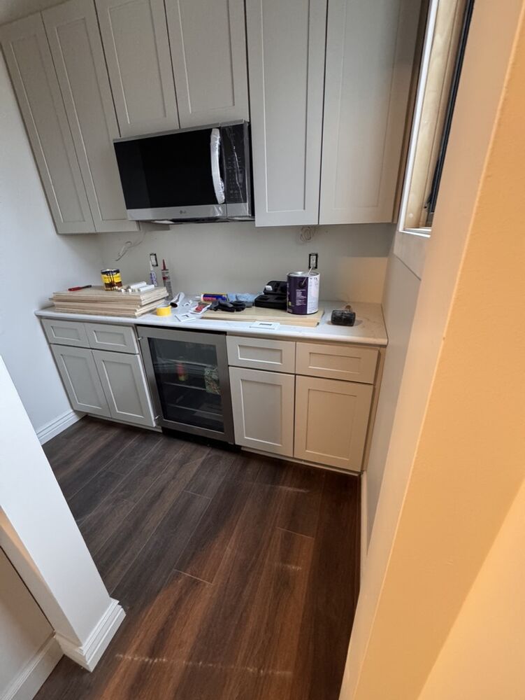 New Tallgrass build, wet bar cabinetry with microwave installed