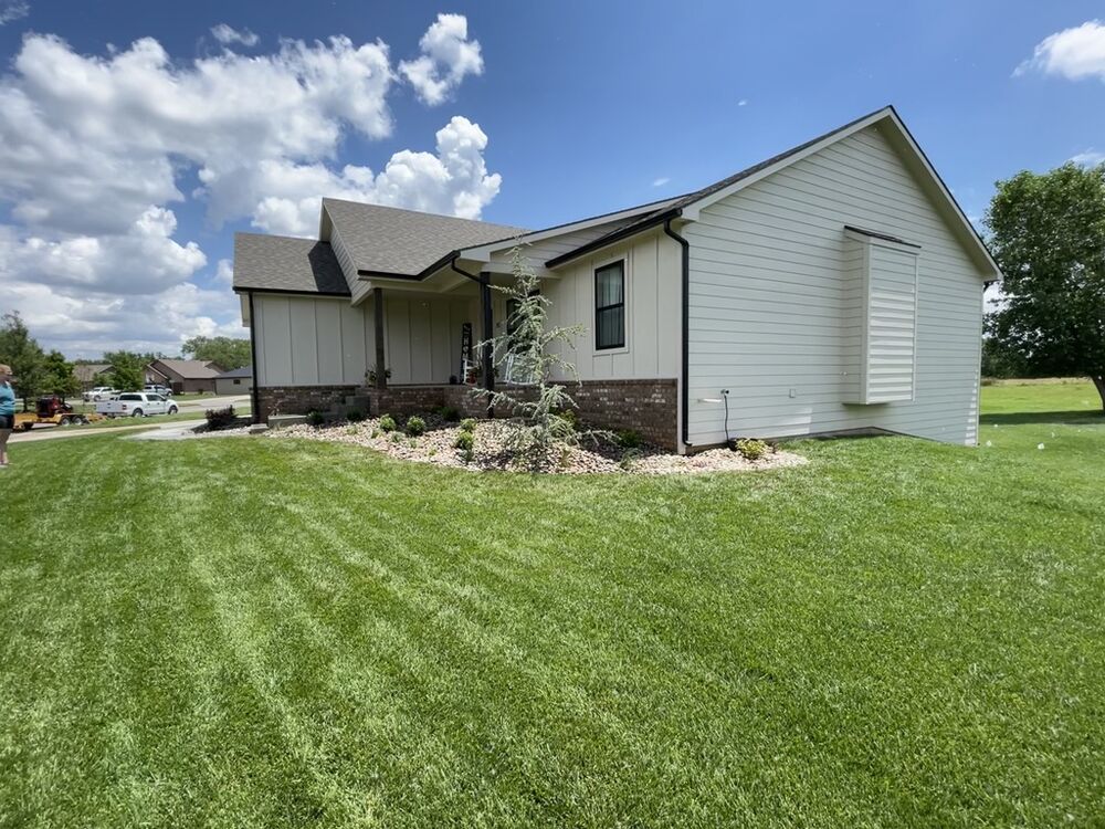 New Tallgrass build, side exterior with landscaping bed