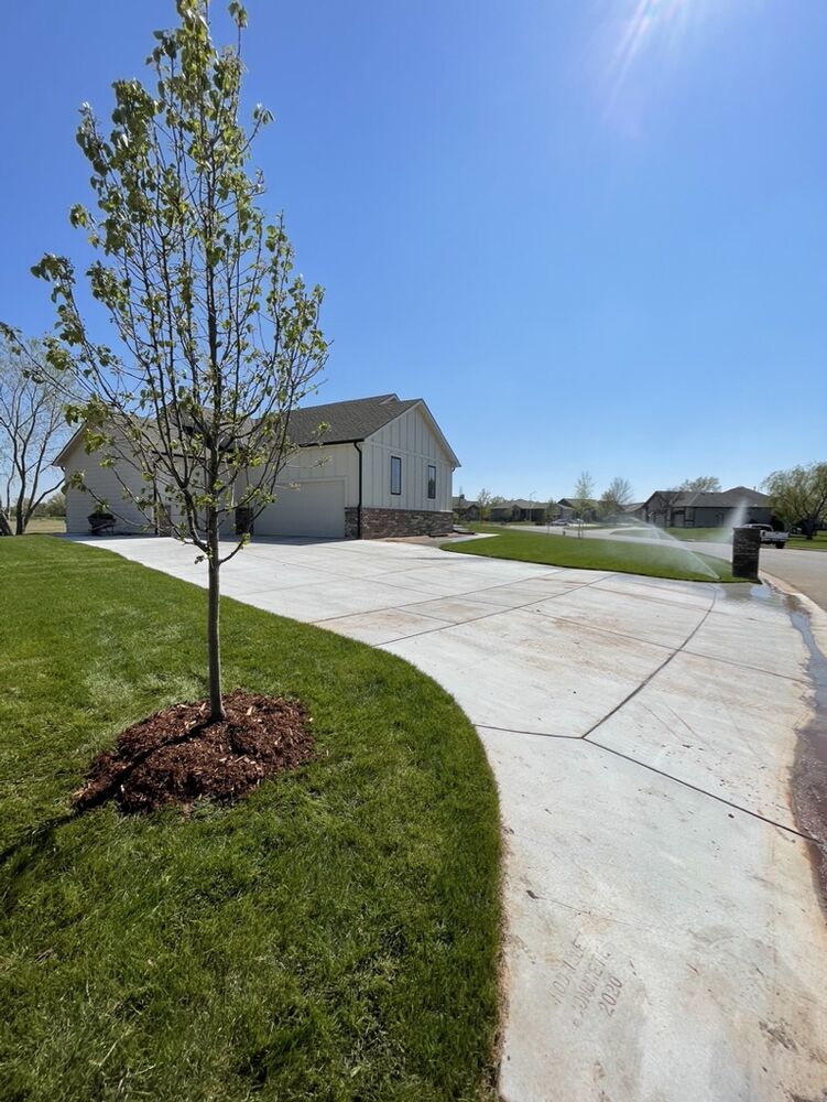 New Tallgrass build, driveway and front approach with new tree