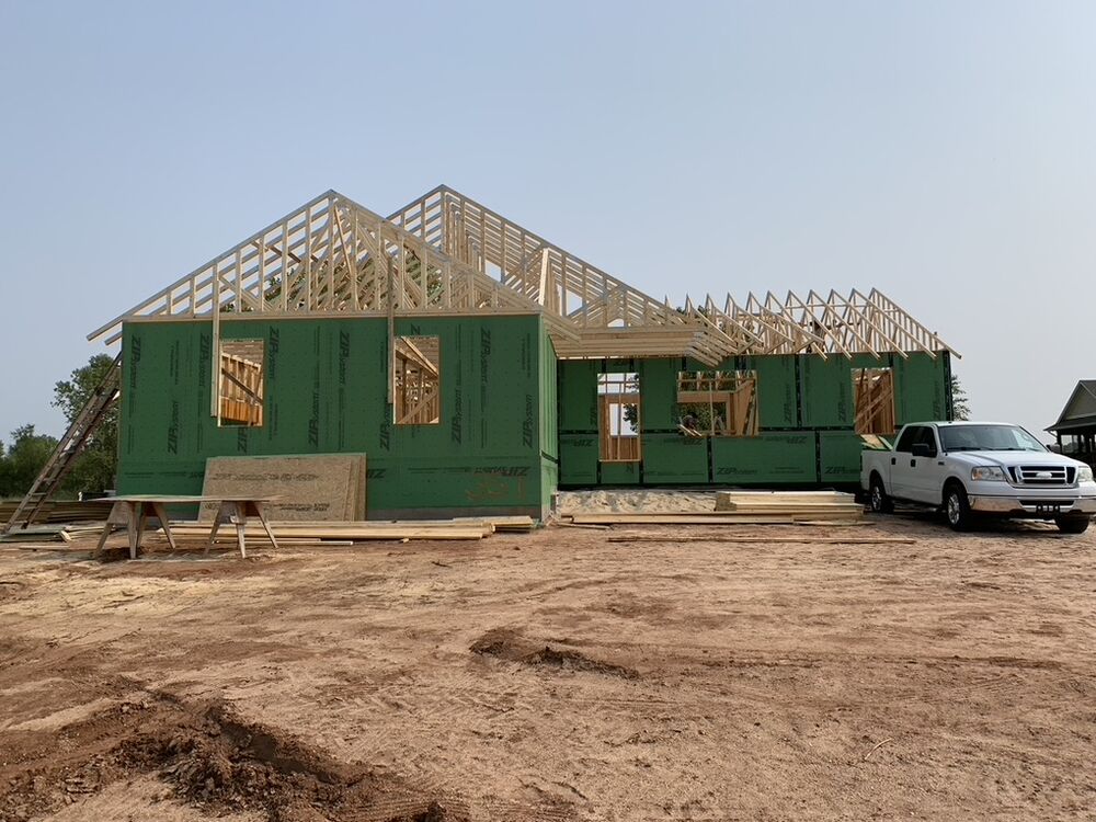 New Tallgrass build, framed home with roof trusses going up