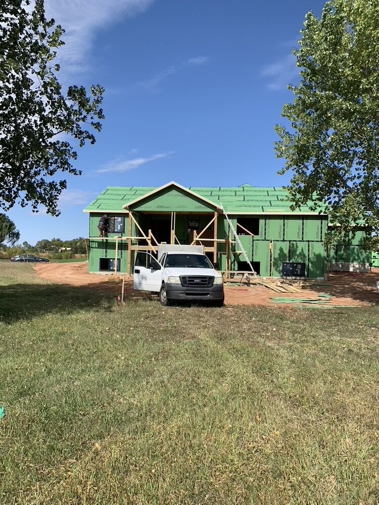 New Tallgrass build, wall sheathing wrapped, front porch framed