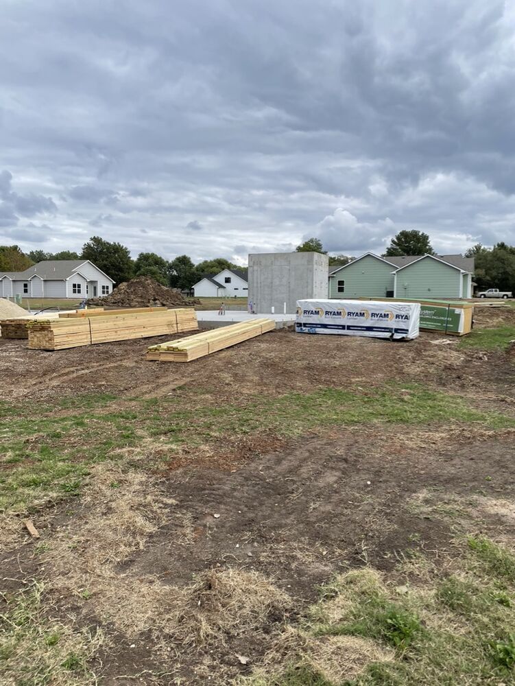 New Tallgrass build, lumber and building materials staged on lot
