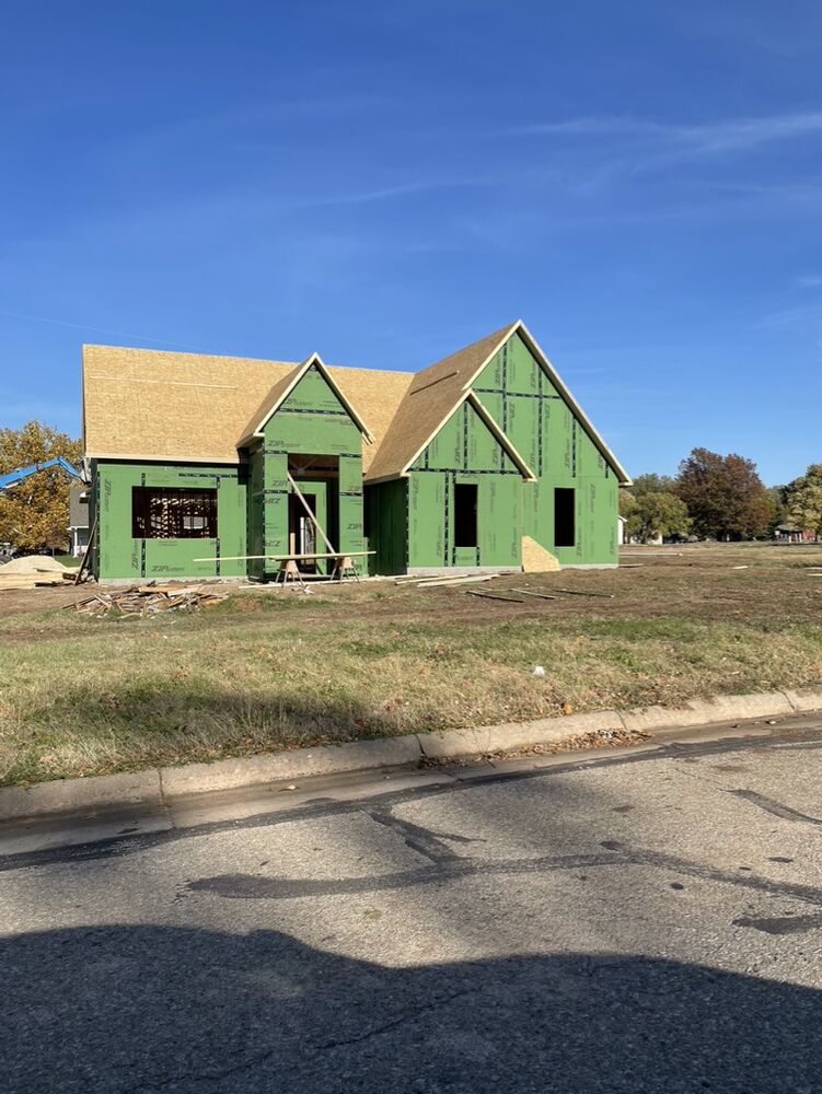 New Tallgrass build, exterior wall sheathing wrapped and roof decking on