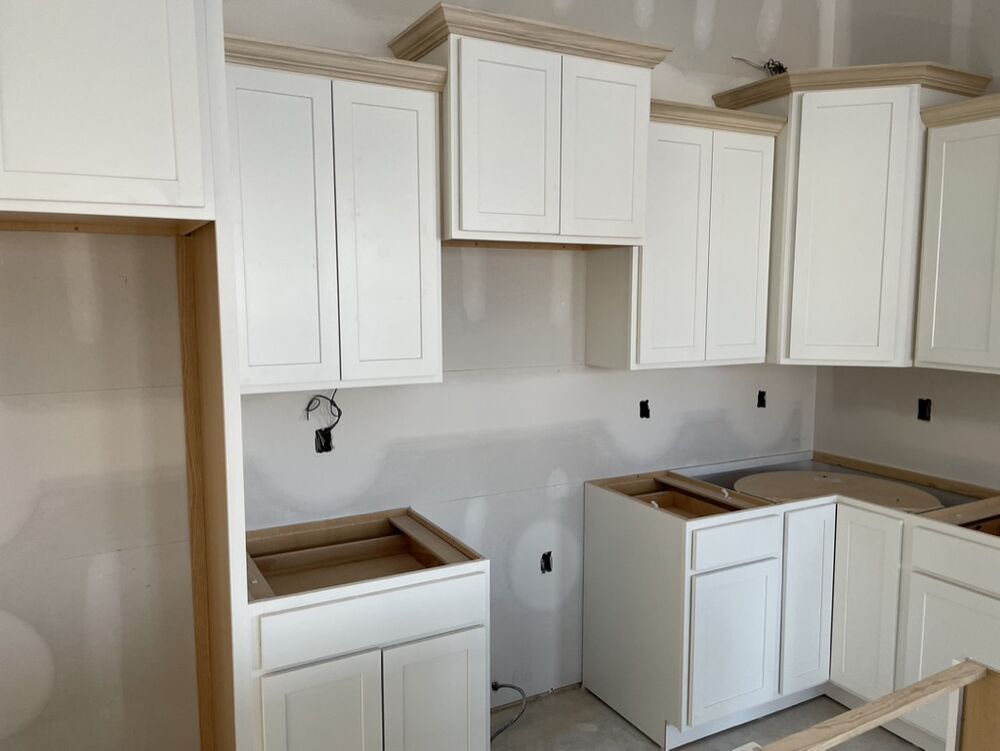 New Tallgrass build, upper kitchen cabinets installed