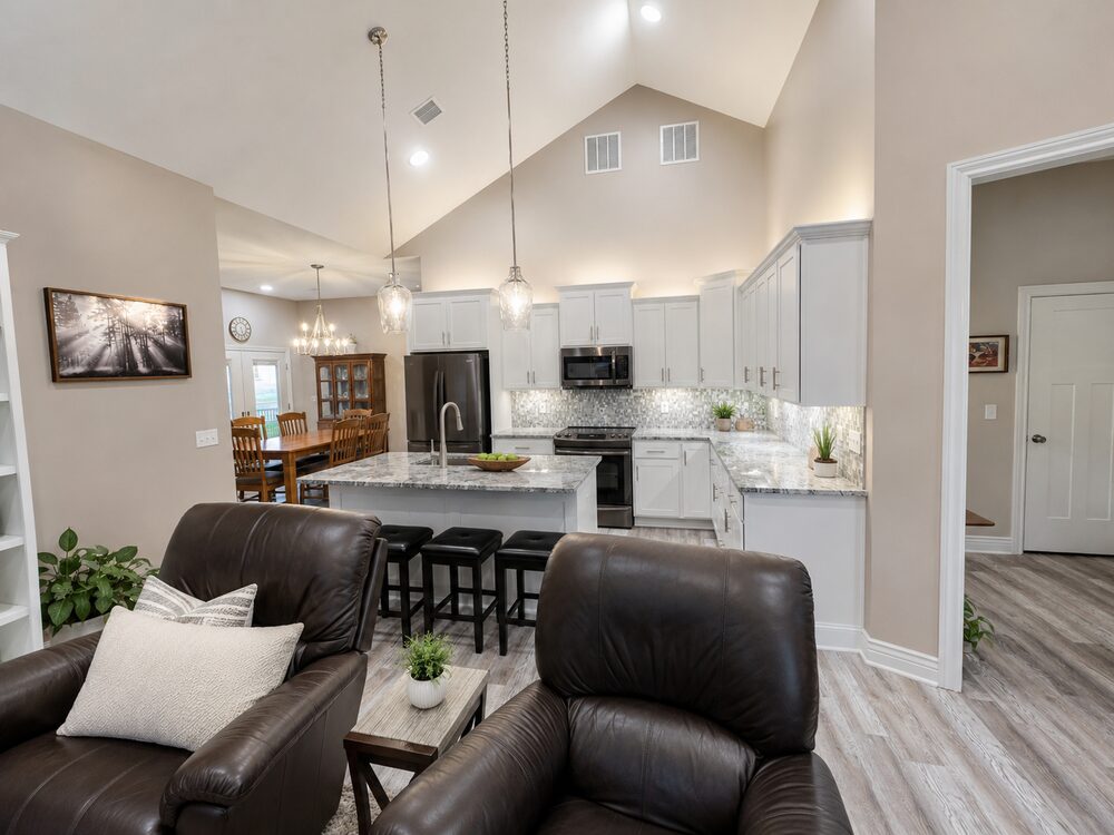 Finished open kitchen and living area with granite island