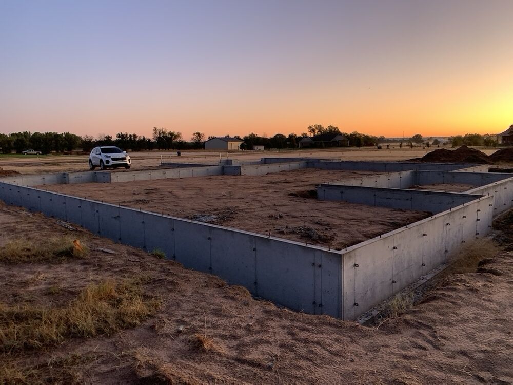 New Tallgrass build, poured foundation walls at sunset